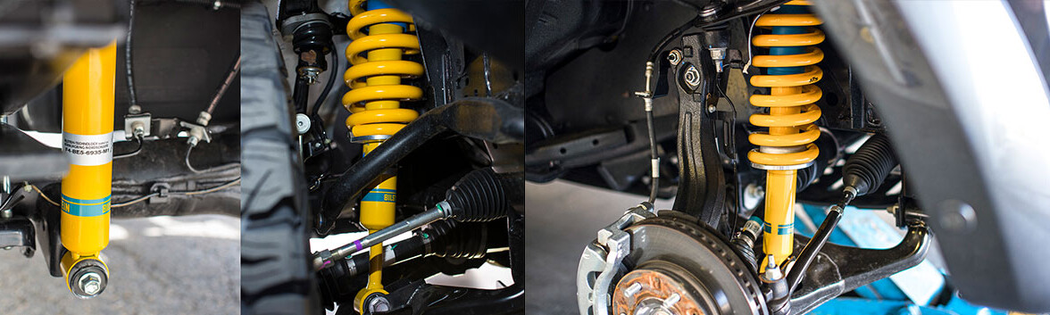 Close up of a series of Bilstein shock absorbers installed for 4WD.